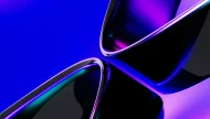 A dynamic abstract 3D render of sleek, curved, glossy shapes illuminated by vibrant neon blue and purple lights against a dark background.